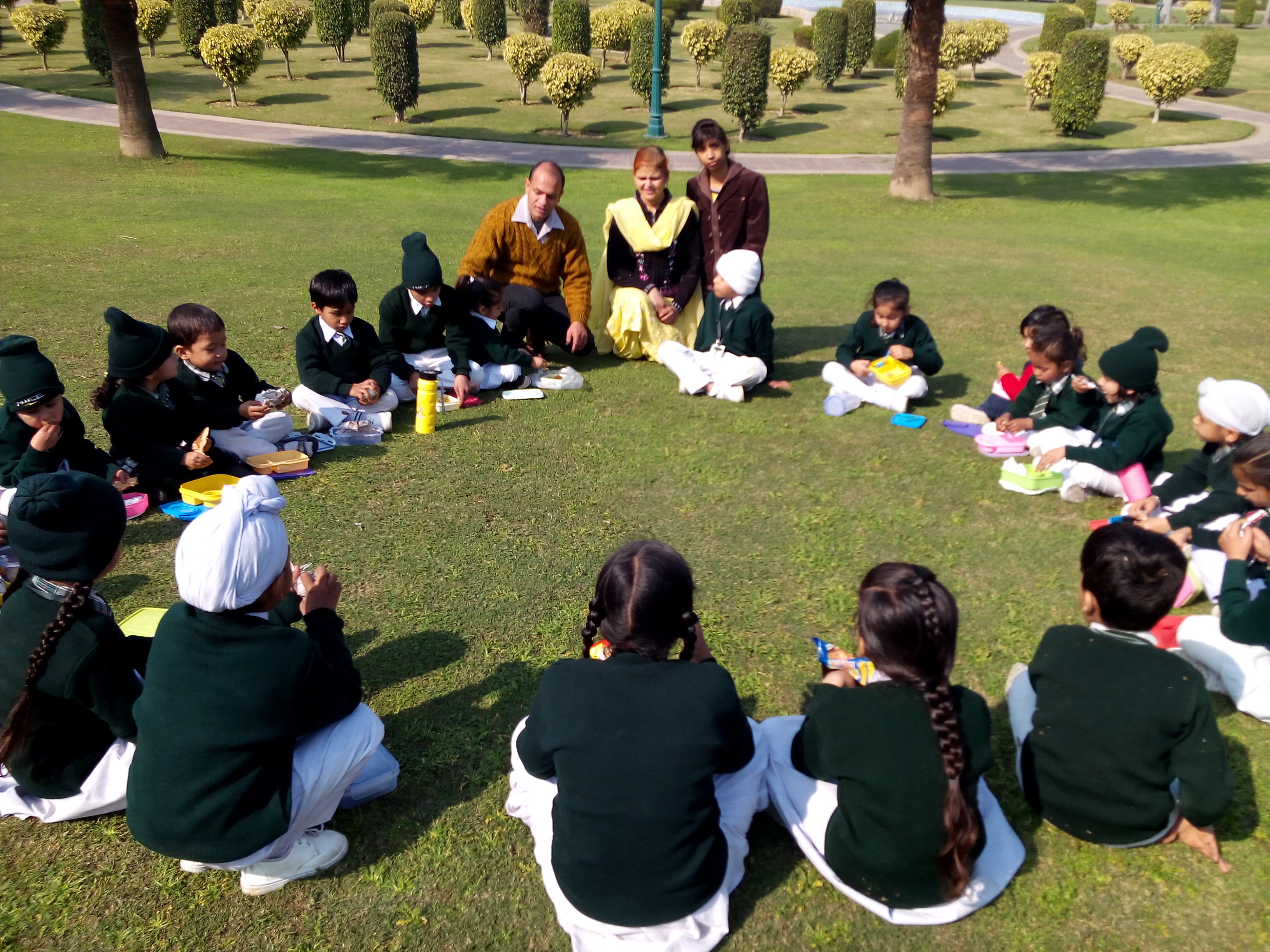 Picnic lunch in circle on grass